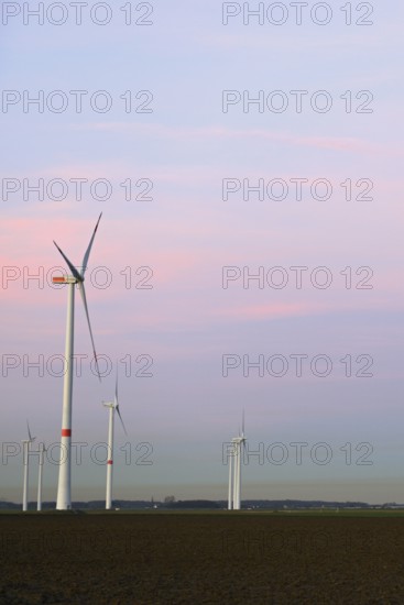 Wind turbines... Energy generation, renewable energy, high wind turbines, wind turbines, wind energy park, wind turbines, wind park in the Bay of Cologne in fine weather in front of polluted sky, polluted air, administrative district of Cologne, North Rhine-Westphalia, Germany, Western Europe