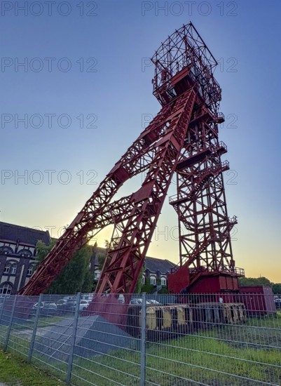 Historic red headframe historic red winding tower of Bonifacius colliery coal mine in today's Kray Nord district, Essen, North Rhine-Westphalia, Germany