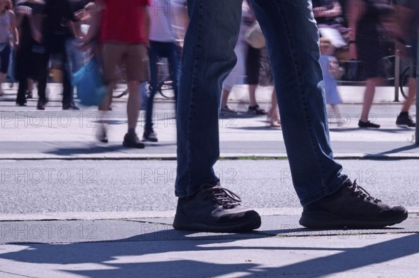 Passers-by in a summer city, shopping, Germany