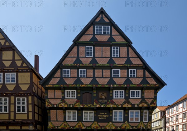 Hoppenerhaus, the most magnificent half-timbered house in the historic centre of Celle with a picture of Duke Ernst the Confessor, Celle, Lower Saxony, Germany