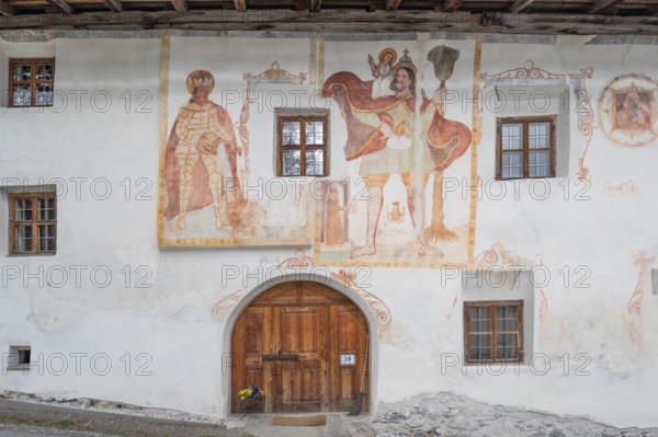 Religious frescoes on a historic farmhouse from 1602, Bahnstraße, Telfes im Stubai, Austria the