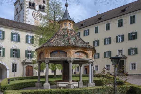 Miracle fountain, 1508, in the courtyard of the Neustift St Margarethen monastery, Vahrn, district of Bozen, South Tyrol, Italy
