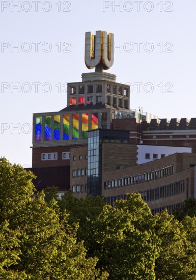 Dortmunder U, Flying pictures by Adolf Winkelmann with green trees, Dortmund, Germany