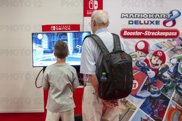 Symbol photo senior with boy playing games