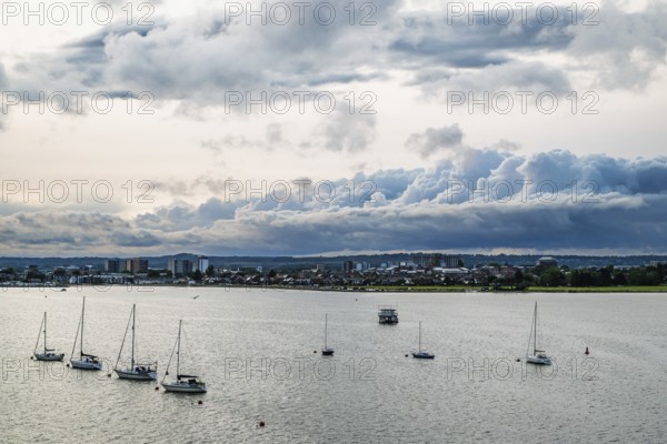 Yachts over Ramshorn Lake and Poole, Brownsea, Dorset, England, United Kingdom