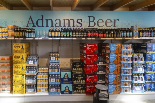 Adnams beer products on display inside brewery shop, Southwold, Suffolk, England, UK
