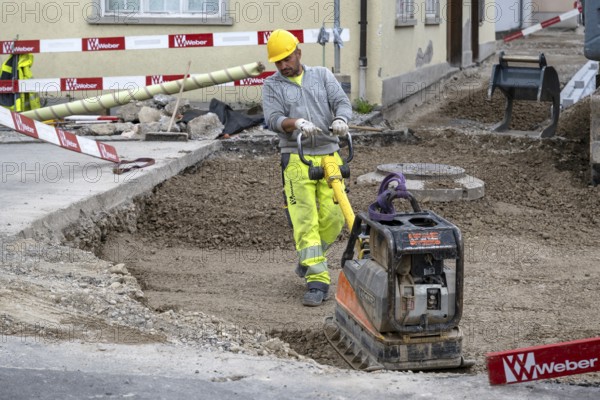 Construction site Road construction Construction worker Vibratory plate
