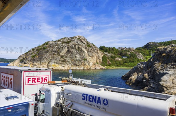 Cars and lorries on a car ferry operating as a floating road, near Lysekil, Bohuslän, Västra Götalands län, Sweden, Scandinavia, for editorial use only
