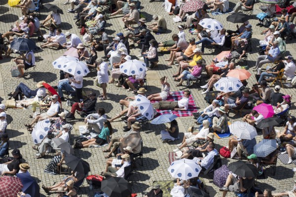 Visitors at the Staatsoper für alle, a free open-air concert with conductor Christian Thielemann and the Staatskapelle Berlin on Berlin's Bebelplatz, Berlin, 22 June 2025