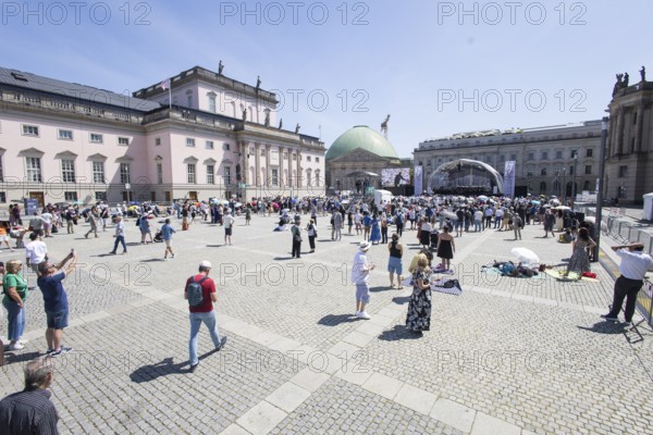 Due to high temperatures, only a few visitors are left after the concert break on Bebelplatz at the Staatsoper für alle, a free open-air concert with conductor Christian Thielemann and the Staatskapelle Berlin on Berlin's Bebelplatz, Berlin, 22 June 2025