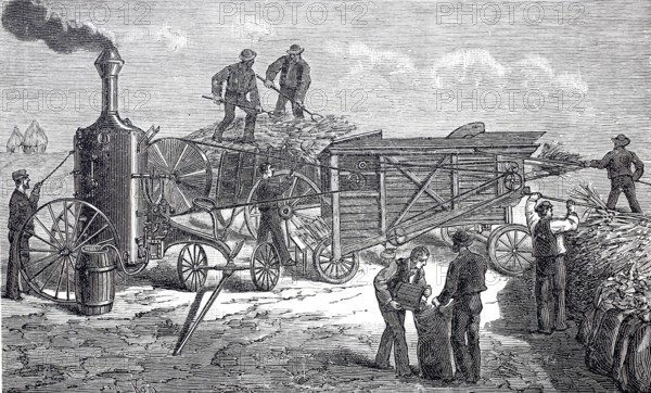 Agriculture, harvest, threshing machine in operation, driven by a locomobile, Aultmann system from Chicago, around 1860, digitally improved reproduction of a 19th century model, historical, exact date unknown