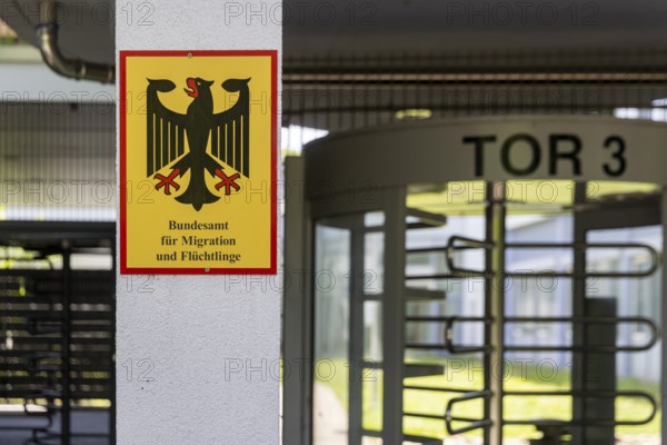 Federal Office for Migration and Refugees (BAMF) . Sign with federal eagle. Competent authority for asylum procedures in Germany. Karlsruhe, Baden-Württemberg, Germany