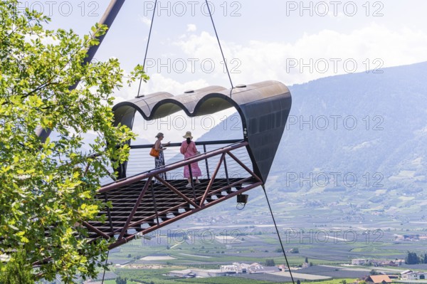 Two people on a platform above the valley with a view of the mountain landscape, Botanical Gardens, The Gardens of Trauttmansdorff Castle, Merano, South Tyrol, Italy