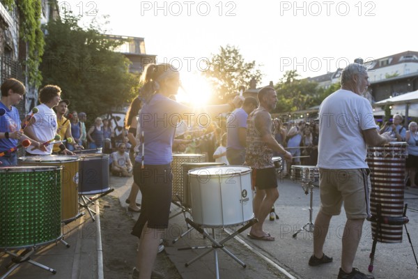 The band Berlin Percussion plays on the RAW grounds as part of the Fête de la Musique. The music event, which originated in France, has been held as a street event on the longest day of the year on 21 June since 1982. The Fête de la Musique has also been held in Berlin since 1995 and is celebrating its 30th anniversary this year. 21.06.2025