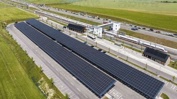 Largest charging park in the world at Merklingen Swabian Alb railway station with ICE. There are 259 covered stations for electric cars under two 160 and 190 metre long roofs. The Swabian Alb special-purpose association and the state are investing around five million euros in the charging park. Merklingen, Baden-Württemberg, Germany