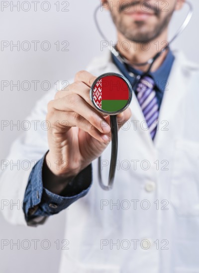 Belarus health and medical insurance concept. Belarus healthcare system, doctor holding stethoscope