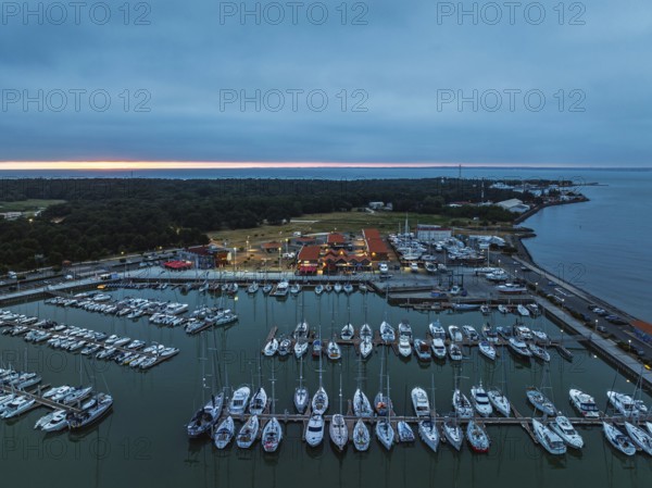 Sunset over Marina in Le Verdon-sur-Mer from a drone, Nouvelle-Aquitaine, Gironde, France, EuropeLe Verdon-sur-Mer, Nouvelle-Aquitaine, Gironde, France, Europe