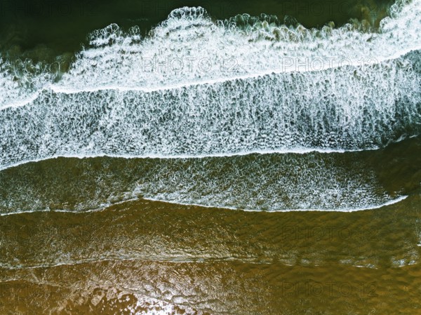 Top Down view over Waves and Contis beach from a drone, Saint Julien en Born, Saint-Julien-en-Born, Landes, France