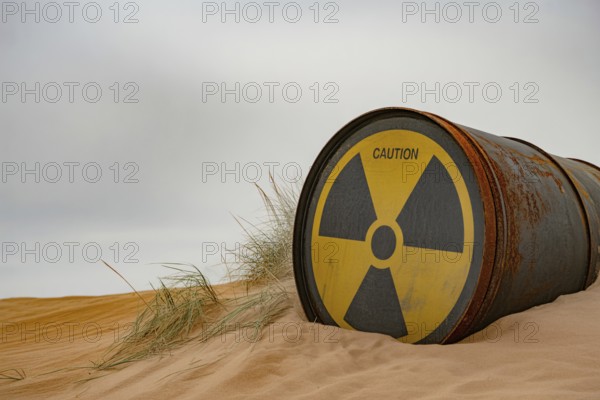 Rusty radiation barrel half-buried in sand under overcast sky. Symbol of environmental danger. Generative ai, AI generated