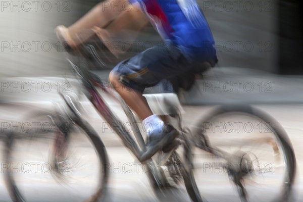 Man riding a bicycle, Photo with motion blur, City of Quito, Pichincha province, Ecuador, South America