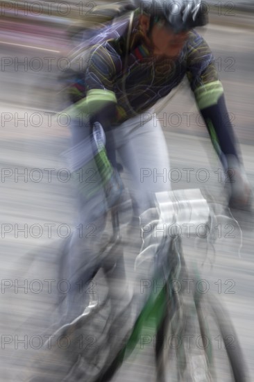 Man riding a bicycle, Photo with motion blur, City of Quito, Pichincha province, Ecuador, South America