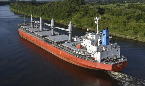 Cargo ship GLORIEUSE travelling through the Kiel Canal, NOK, Kielkanal, Kiel Canal, Schleswig-Holstein, Germany