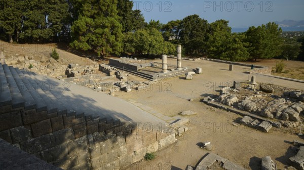 Wide angle view of an ancient landscape with ruins and trees under a clear sky, open staircase, Asklepios Temple, Asklipion, Asklepieion, healing temple, temple, Hippocrates, Kos, Dodecanese, Greek Islands, Greece