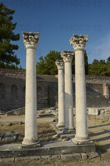 Three ancient columns in a historic landscape of ruins with clear sky, Temple of Apollo, Corinthian Columns, Asklipion, Asklepieion, Healing Temple, Temple, Hippocrates, Kos, Dodecanese, Greek Islands, Greece