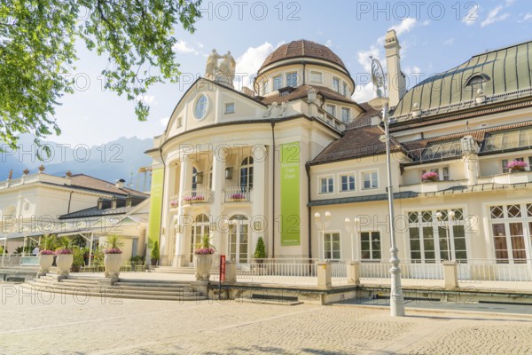 Magnificent building with decorative façade under a blue sky, Merano, Italy
