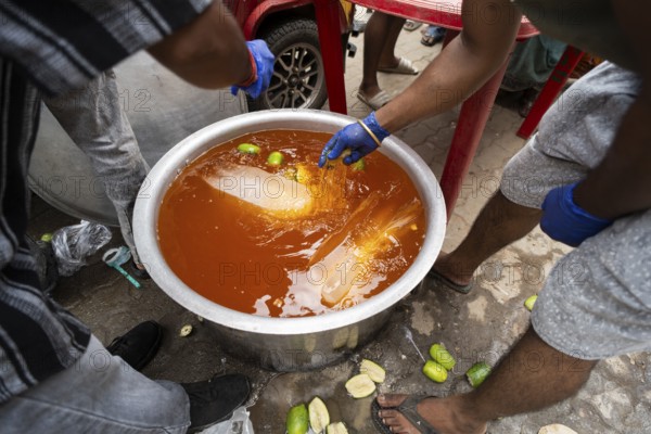 Volunteers makes Sarbat to offer devotees during Ambubachi Mela, in Guwahati, India on June 22, 2025. The Ambubachi Mela is one of the most spiritually significant and culturally unique festivals in India