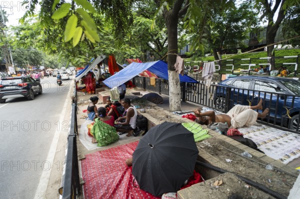 Devotees staying in street divider as they arrives to visit Kamakhya Temple during Ambubachi Mela, in Guwahati, India on June 22, 2025. The Ambubachi Mela is one of the most spiritually significant and culturally unique festivals in India