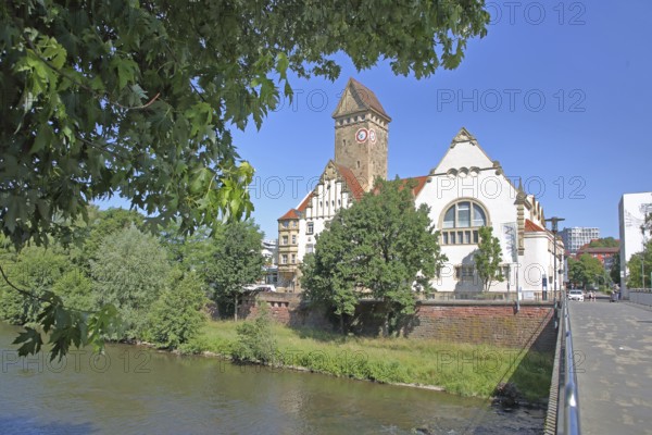 Former Emma-Jaeger-Bad, swimming pool built in 1911 in Art Nouveau style on the River Enz, today's Emma Creative Centre, bank, tower, pedestrian bridge, Pforzheim, Northern Black Forest, Black Forest, Baden-Württemberg, Germany