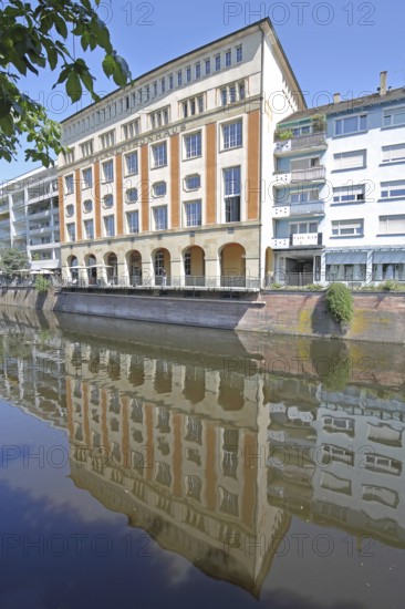 Melanchthonhaus with arcade built in 1914, reflection, Enz, river bank, Pforzheim, Northern Black Forest, Black Forest, Baden-Württemberg, Germany