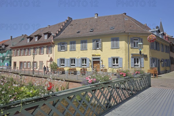 Half-timbered houses on the Alb, pedestrian bridge with bridge railing and floral decoration, Ettlingen, Black Forest, Northern Black Forest, Baden-Württemberg, Germany