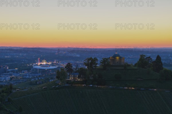 View of a chapel and town at sunset, with lights and vineyards, grave chapel, Zum Württemberg, spring festival, Rotenberg district, Stuttgart, Baden-Württemberg, Germany