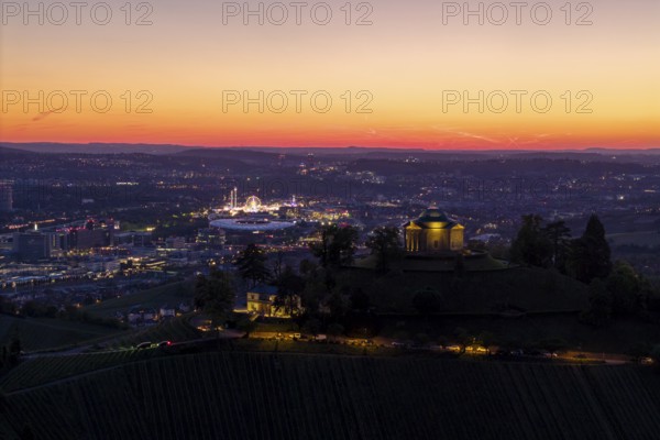 Panoramic view of an illuminated town and chapel at sunset, grave chapel, spring festival, Zum Württemberg, Rotenberg district, Stuttgart, Baden-Württemberg, Germany