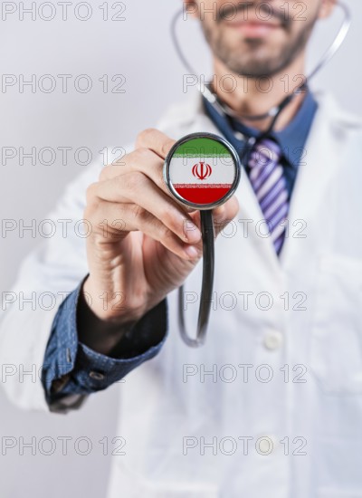 Iran health and medical insurance concept. Iran healthcare system, doctor holding stethoscope