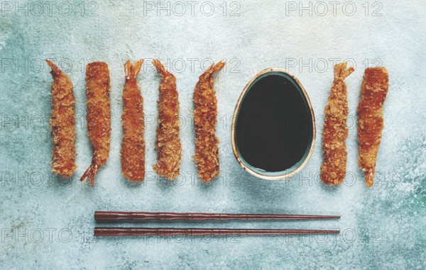 Fried tiger prawns in tempura, top view, soy sauce, chopsticks