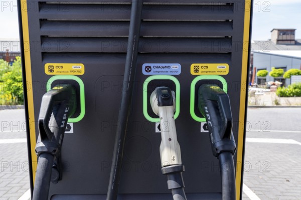 Electric charging station on the site of the former Lohberg colliery in Dinslaken, operated by Fastned, uses electricity from wind power and solar energy, fast-charging columns, with its own solar roof, Lohberg, North Rhine-Westphalia, Germany