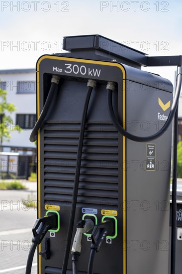 Electric charging station on the site of the former Lohberg colliery in Dinslaken, operated by Fastned, uses electricity from wind power and solar energy, fast-charging columns, with its own solar roof, Lohberg, North Rhine-Westphalia, Germany