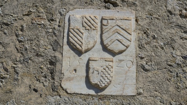 Coat of arms of the Grand Master del Carretto, close-up of stone coat of arms on a historic wall, Antimacheia, Medieval fortress, St John's fortress, Antimachia, Kos, Dodecanese, Greek Islands, Greece