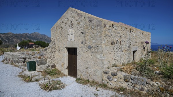 Chapel Agios Nikolaos, Old stone house in Mediterranean landscape with clear blue sky in the background, Antimacheia, Medieval Fortress, St John's Fortress, Antimachia, Kos, Dodecanese, Greek Islands, Greece