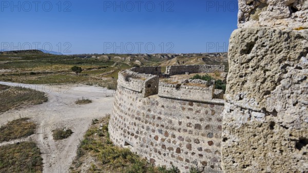 Bastion, Defence walls, Massive stone fortifications in a dry, extensive landscape, Antimacheia, Medieval fortress, St. John's fortress, Antimachia, Kos, Dodecanese, Greek Islands, Greece
