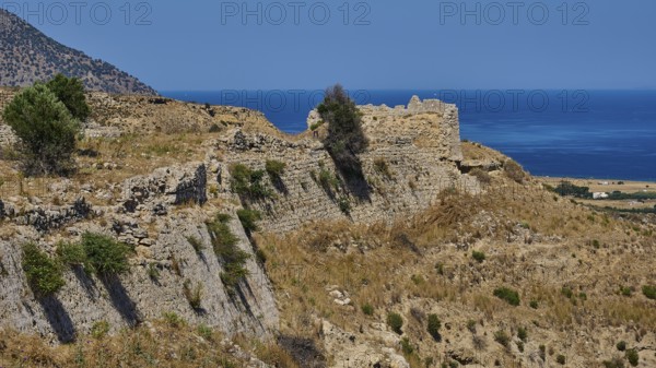 Weathered ruins on a dry coastal hill overlooking the sea, Antimacheia, Medieval fortress, St John's fortress, Antimachia, Kos, Dodecanese, Greek Islands, Greece