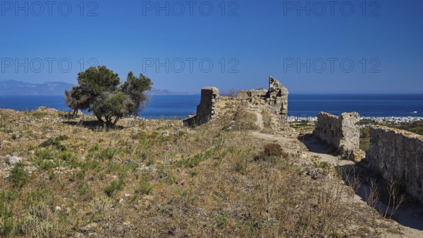 Ruins overlooking the sea under a clear blue sky, Kardamina, Antimacheia, Medieval Fortress, St John's Fortress, Antimachia, Kos, Dodecanese, Greek Islands, Greece