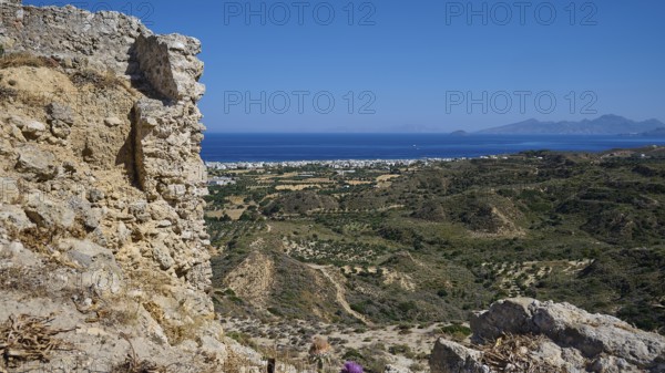 Rocky ruins with views of the sea and a hilly coastal landscape, Kardamina, Antimacheia, Medieval fortress, St John's fortress, Antimachia, Kos, Dodecanese, Greek Islands, Greece
