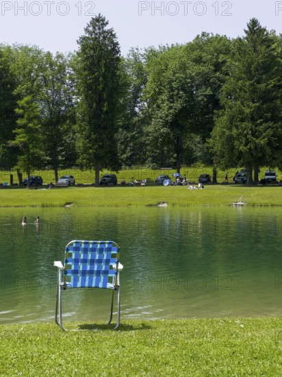 Camping chair by a lake