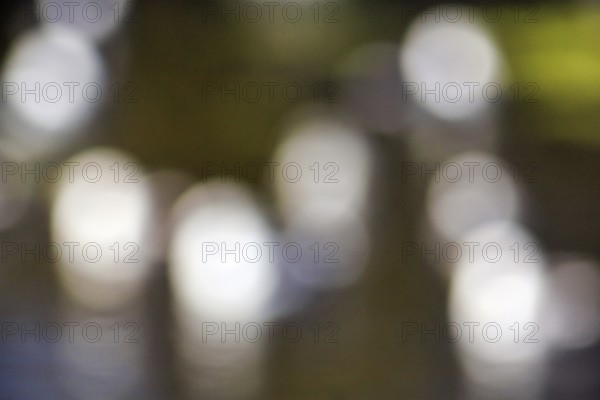 White bokehballs, light reflections on pond, water surface, wallpaper, island dune, Heligoland, Schleswig-Holstein, Germany