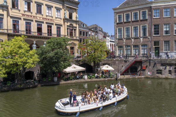 The old town centre of Utrecht, Oudegracht, around 2 km long with many old houses, shops, restaurants directly on the canal, many bridges, boat traffic of all kinds, canal cruise, Netherlands