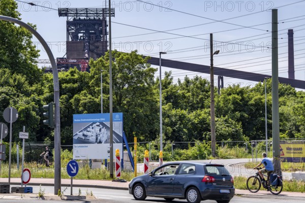 Construction site sign for thyssenkrupp Steel's first direct reduction plant, the climate-neutral steel production project, at the existing steelworks in Duisburg-Farn, pig iron production without a conventional blast furnace but using hydrogen, due to go into operation by the end of 2027, North Rhine-Westphalia, Germany